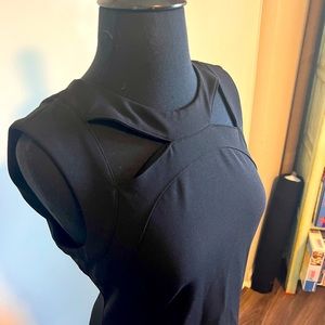 Calvin Klein little black dress size 8. Cutout detail. Geometric. Fitted.